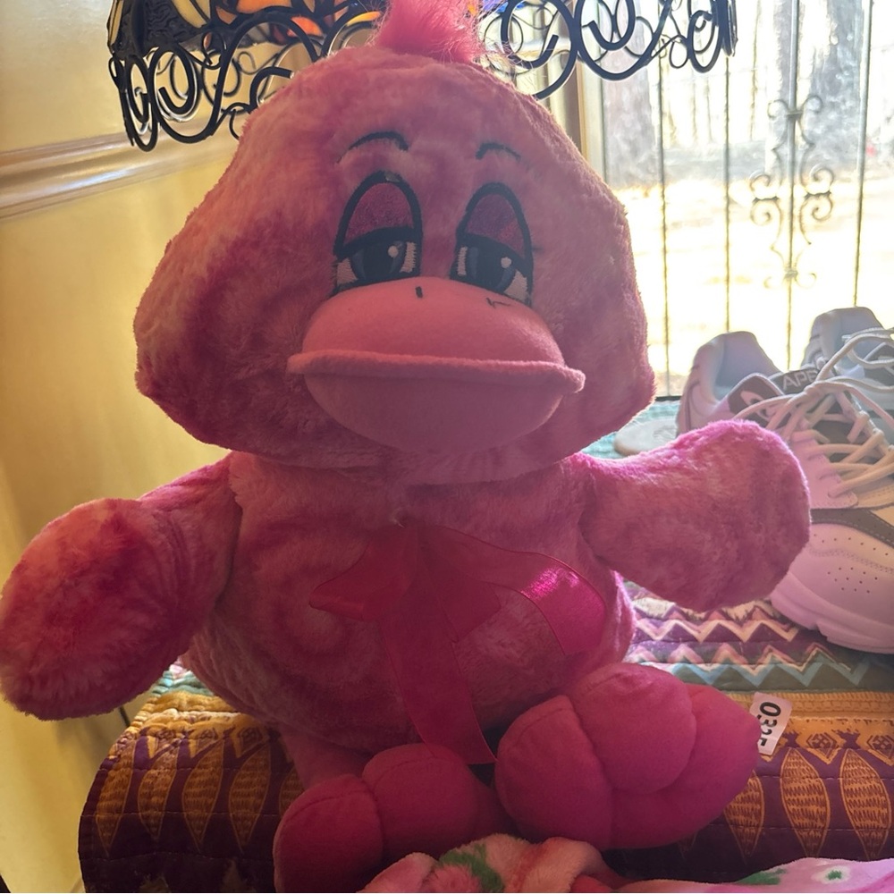 Cute 15” LuckyDuck Pink Swirls with Bow. Super cute.